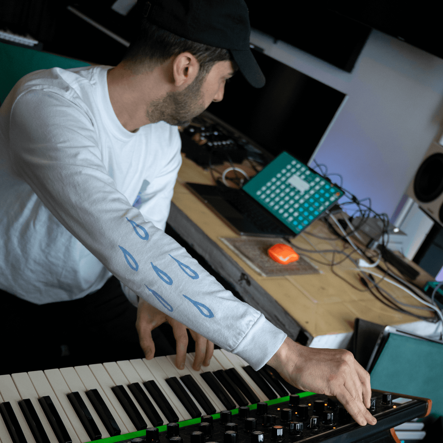 Nael wearing DRAMA Tears Sold Separately Long Sleeve Tee