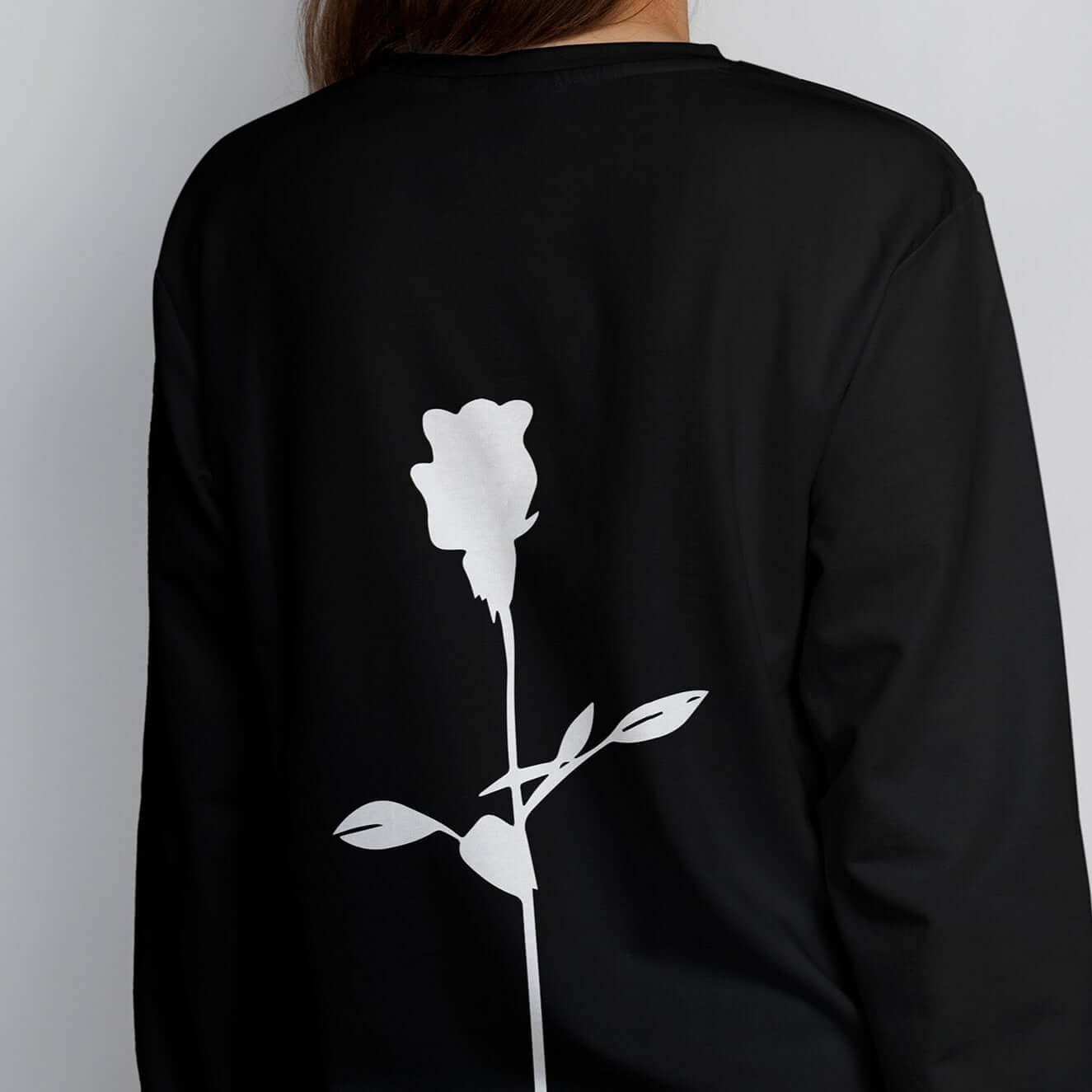 Woman wearing DRAMA Rose Long Sleeve Tee