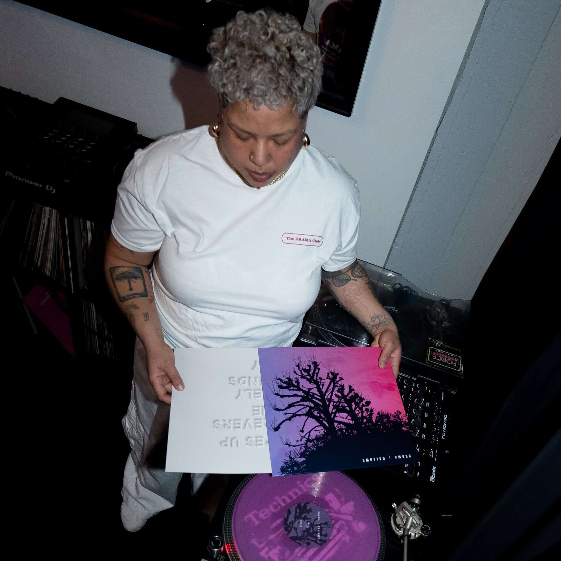 Via wearing DRAMA Club Tee