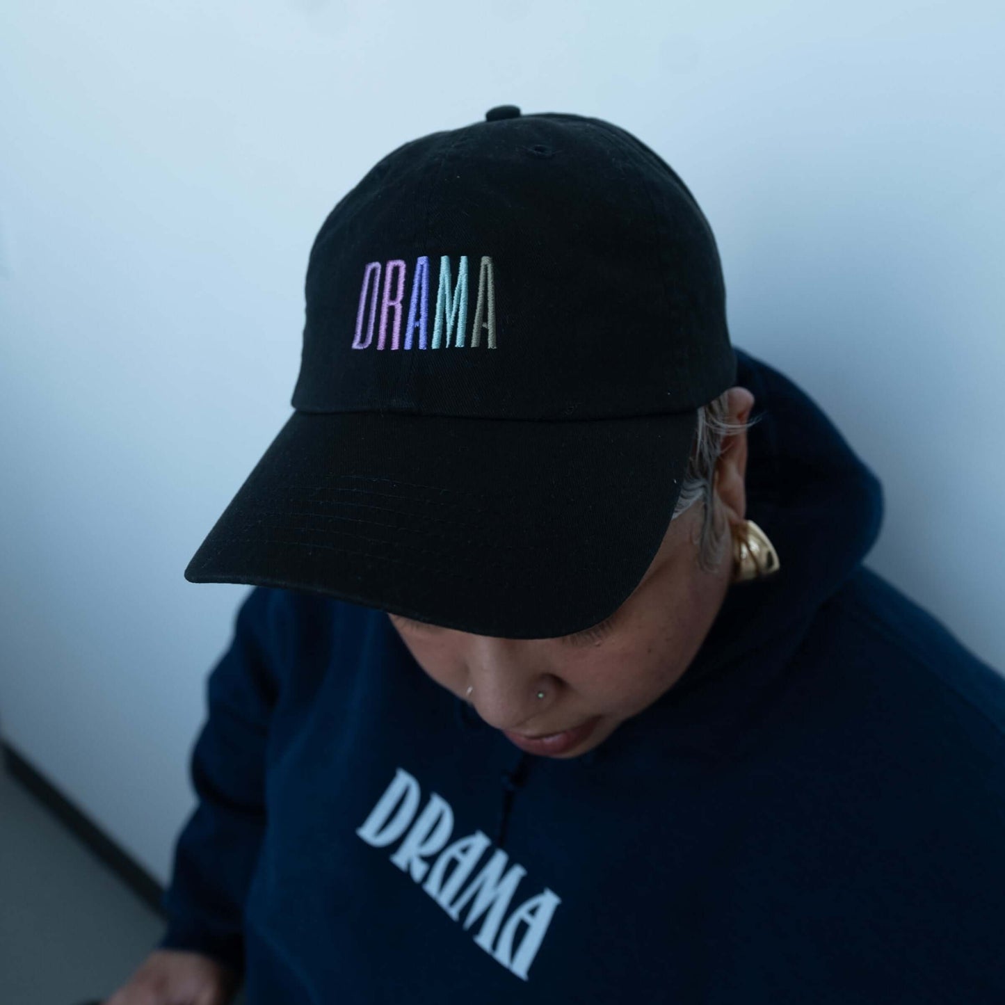 Via wearing DRAMA Logo Cap in Multi