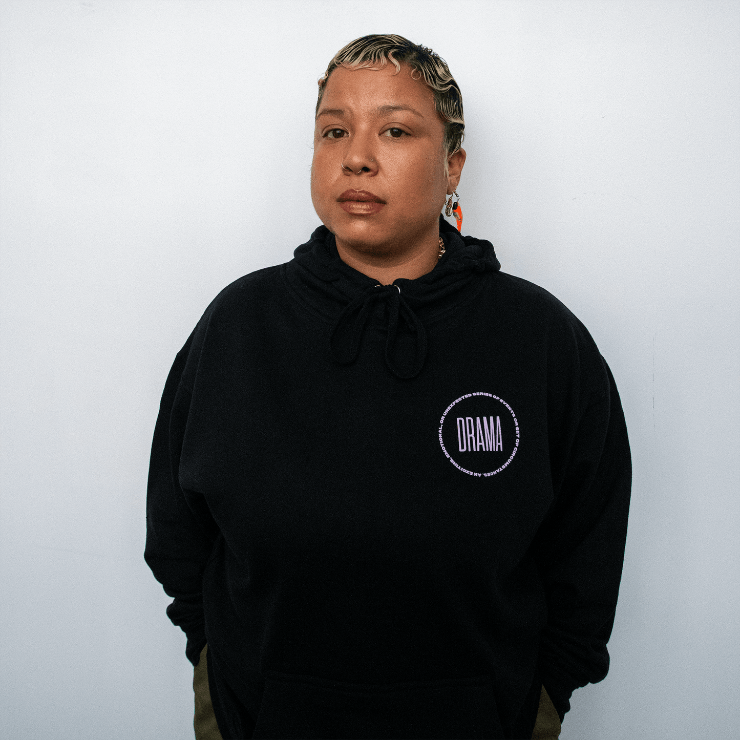 Via wearing DRAMA Definition Hoodie in navy