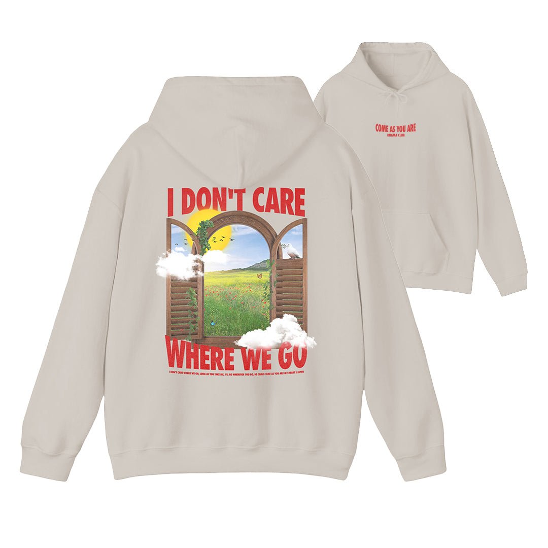 front and back of beige hoodie with come as you are printed in red on the front upper center chest and I don't care where we go text and window sunset graphic printed on the full back
