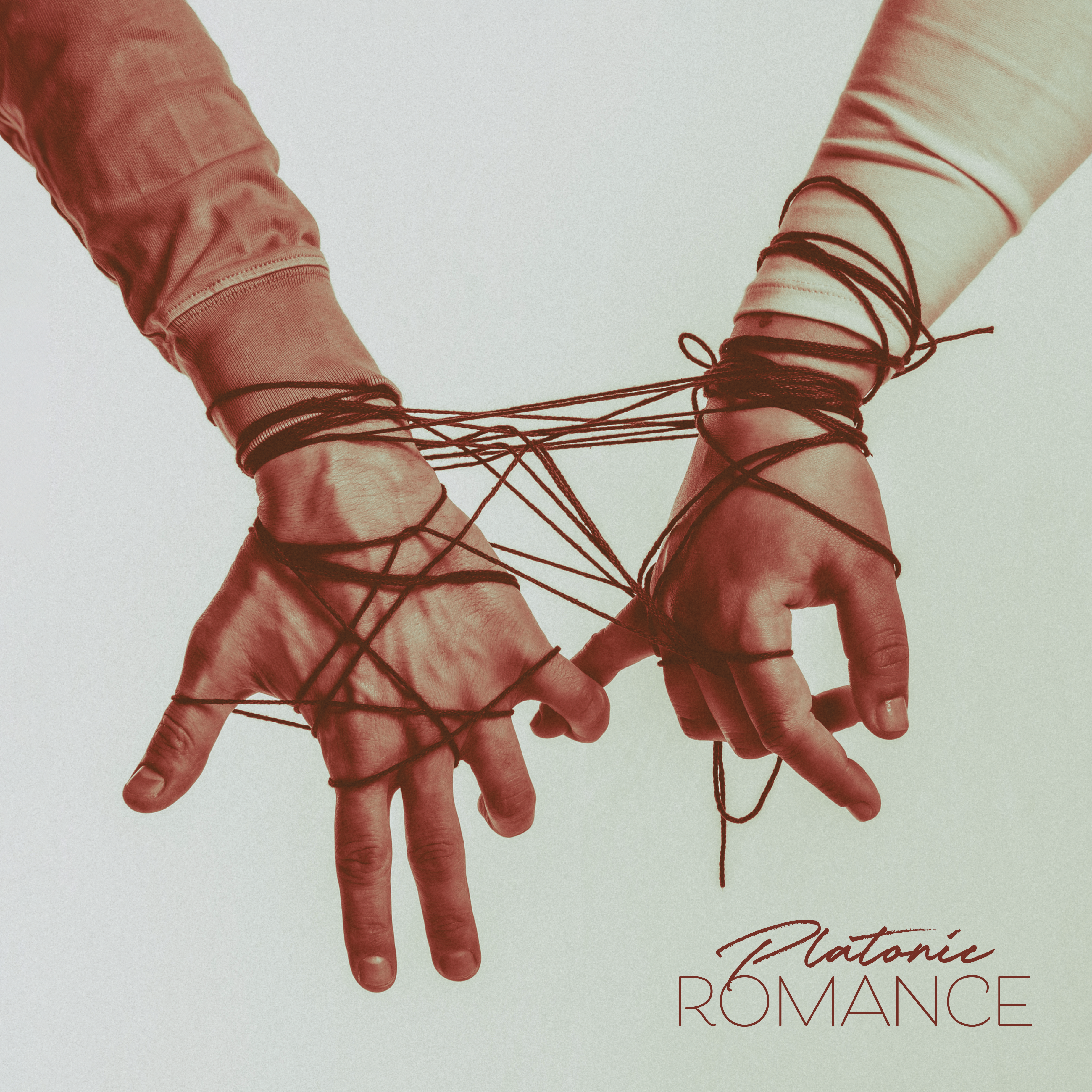 DRAMA platonic Romance front cover of two hands intertwined with a burgundy string and Platonic Romance text on the lower right corner in burgundy on a mint green background