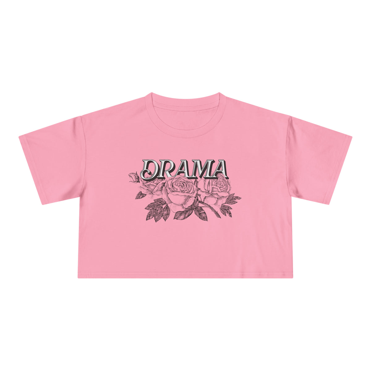 Front view of pink DRAMA Roses Crop Top with black DRAMA lettering above pink roses and dark leaves.